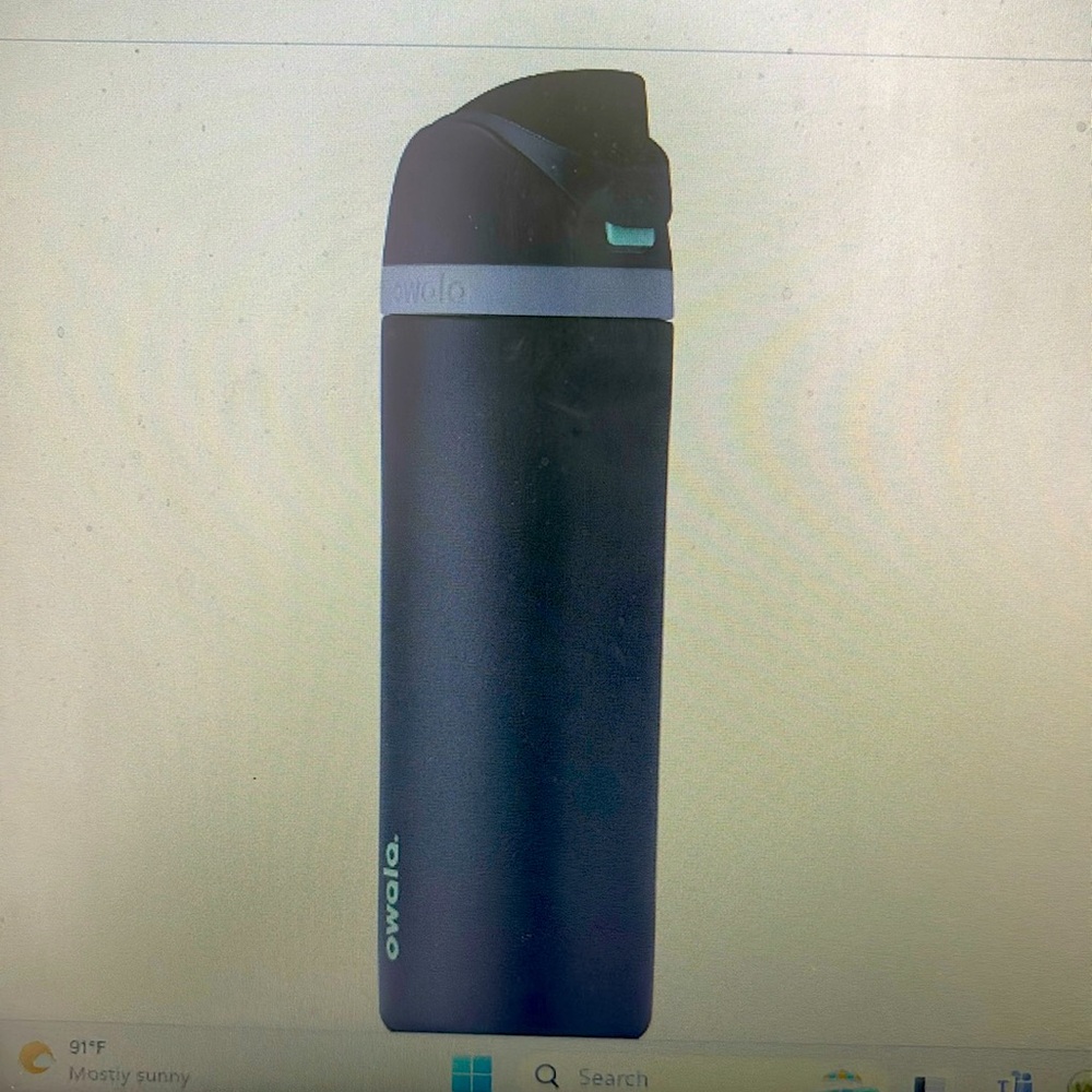 Owala Stainless Steel Water bottle with straw.